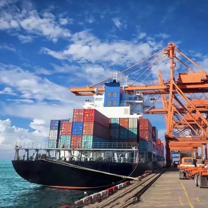 1 A large cargo ship docked at the dock.
