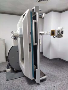 A large white room with a large machine.